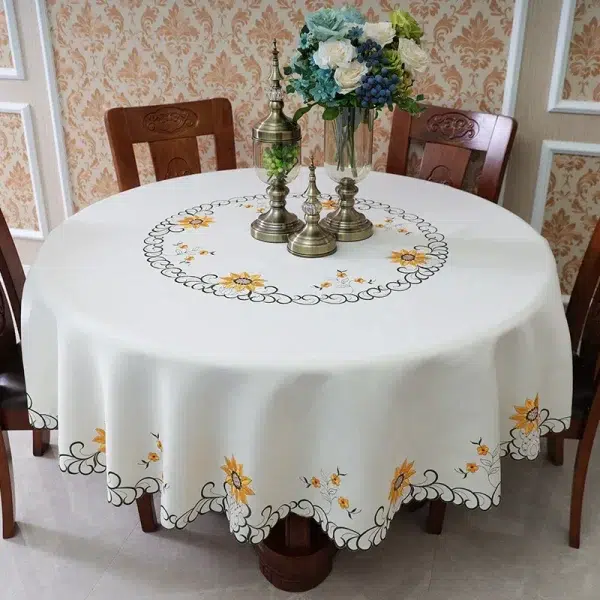 nappe ronde blanche brodée jacquard à fleurs jaunes